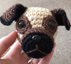 cuddly crochet dog being made - head first